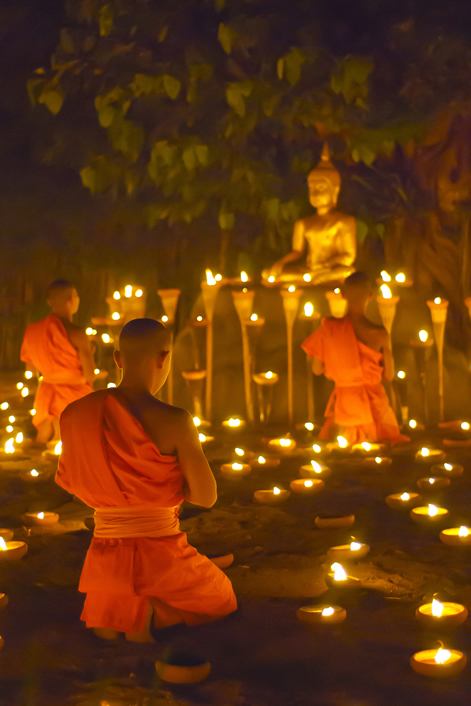 Buddhist monks praying