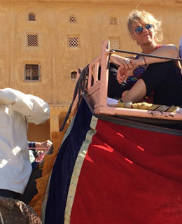 Gabriela Cavillon enjoying elephant ride at Fort Amber